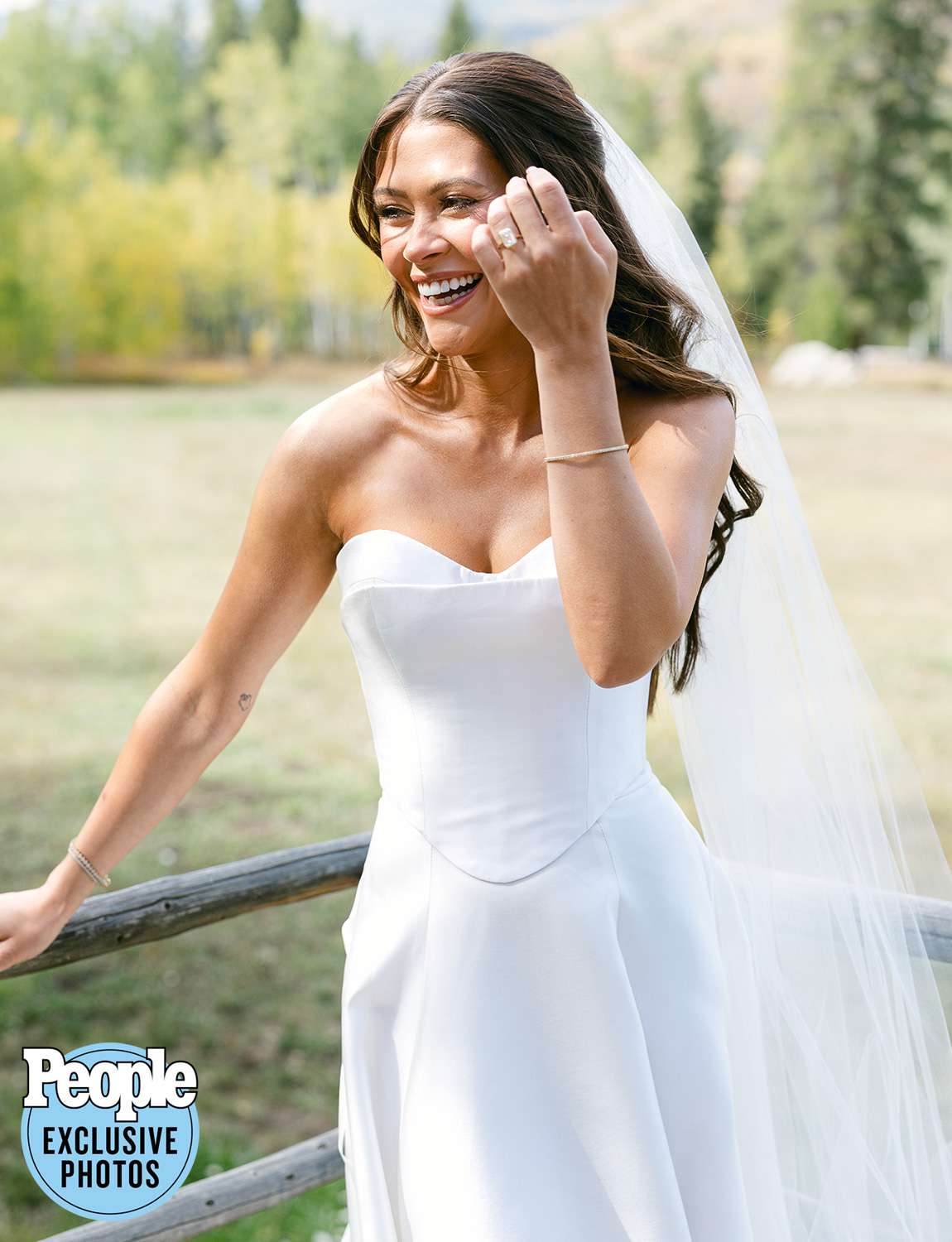 A gushing bride showing off her Caelynn dress