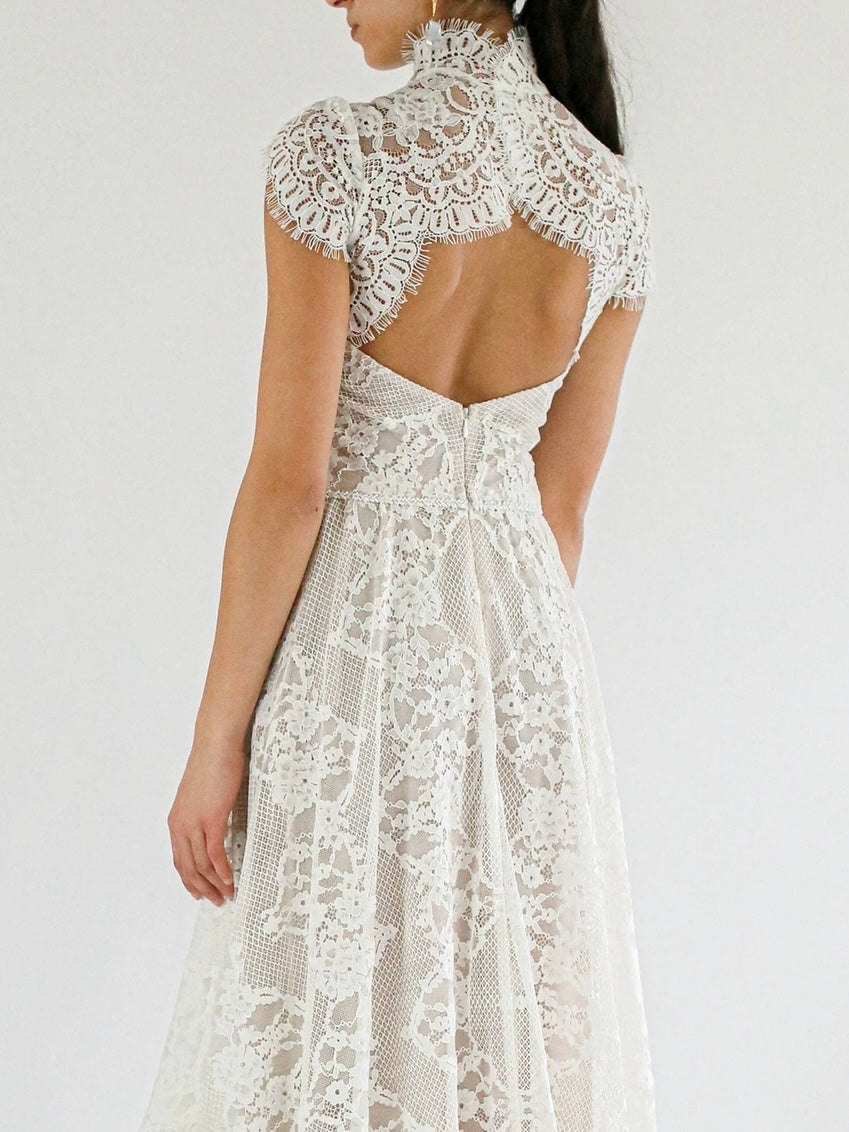 A close up of the back of the Carol Cap Sleeve Lace Dress