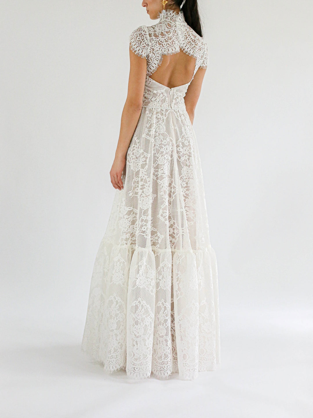 A view of the open back Carol Cap Sleeve Lace Dress