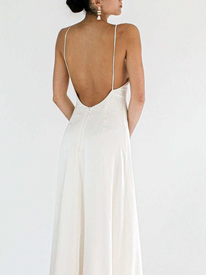 Close view of the back of the Amelia cowl neck wedding dress