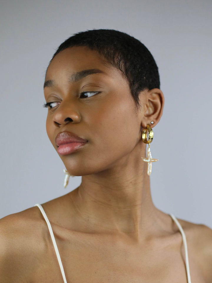 Adorn yourself with Charlotte Alegria's Cross My Heart Earrings