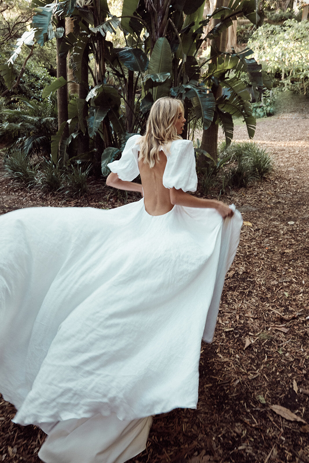 Model Walking in Auldyn Wedding Dress