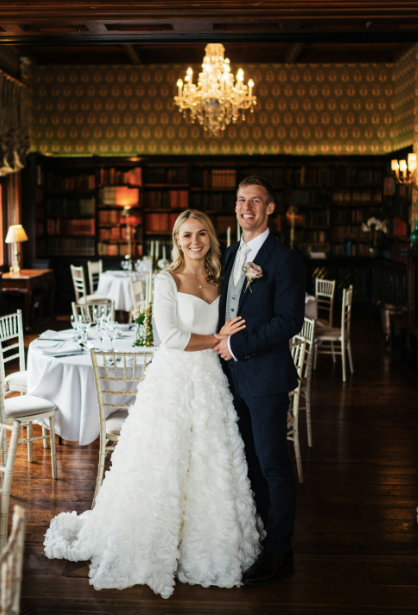 Shine on your day in this wedding gown that showcases timeless glamour