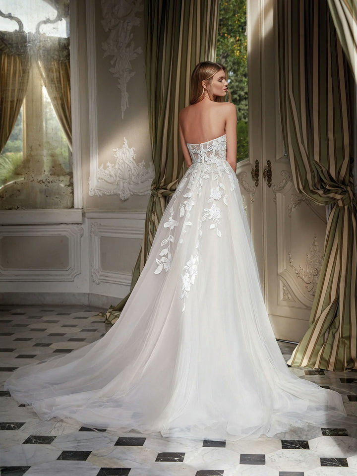 A view of the back of the Chiara Tulle Wedding Dress