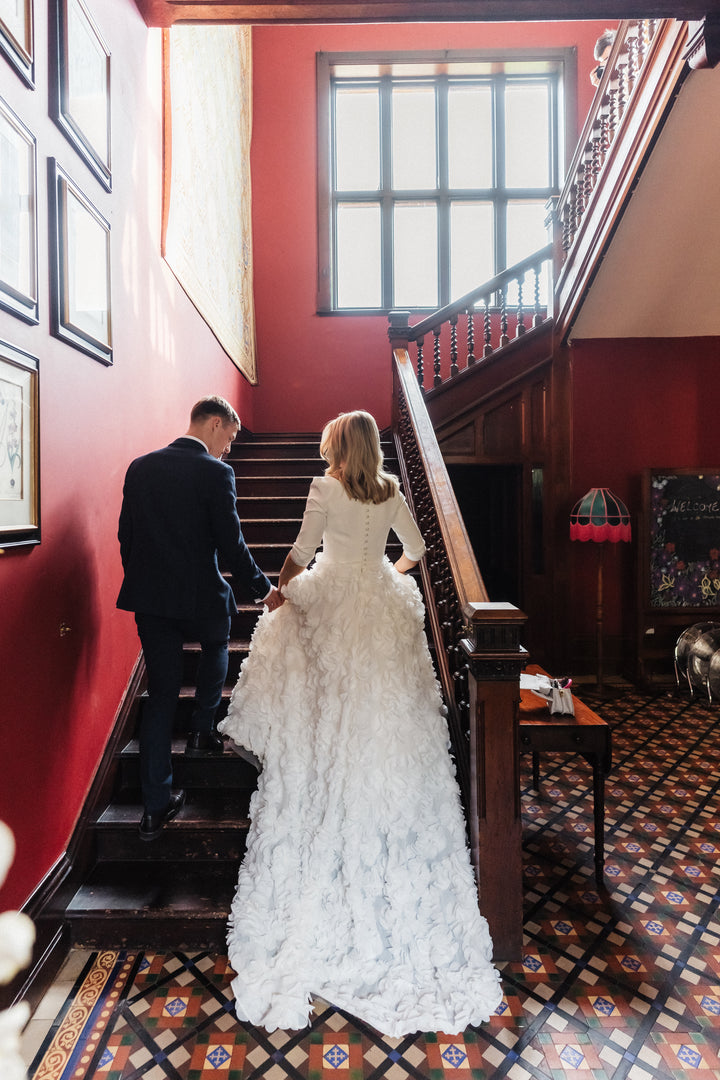 A back view of the Darcy Tara Long Sleeve Wedding Gown