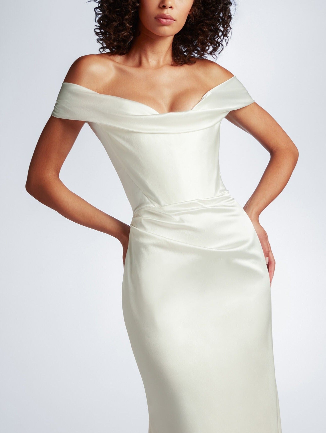 A close up of the feminine neckline on the Cora Cocotte wedding dress